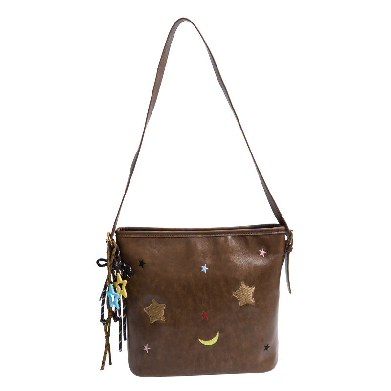 Schultertasche mit Charmanten Applikationen Brehn
