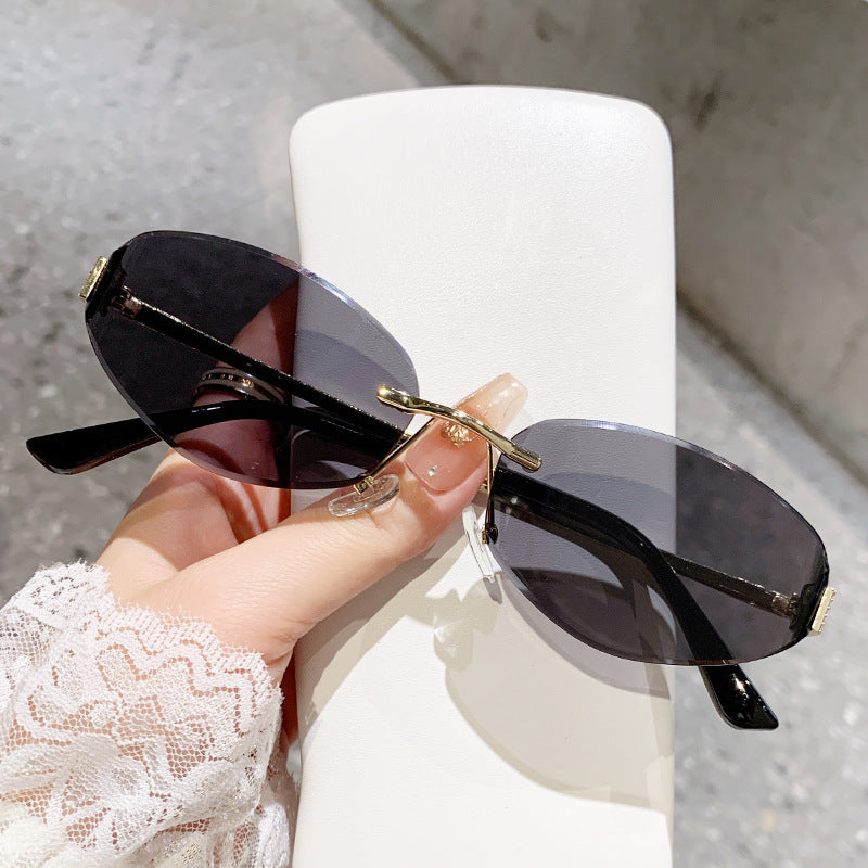 Damen Sonnenbrille im modernen Ovaldesign mit kontrastierendem Rahmen Brehn