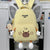 Niedlicher Cartoon Arm-Handtasche Rucksack