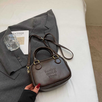 Schlanke strukturierte Mini-Schultertasche Brehn