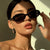 Damen Cat-Eye Sonnenbrille mit transparentem Rahmen und gradienten Gläsern Brehn