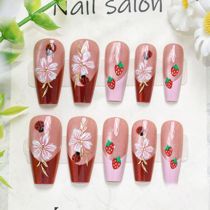 Künstlerisches Press-On-Nagelset mit Kirschblütenmuster Brehn