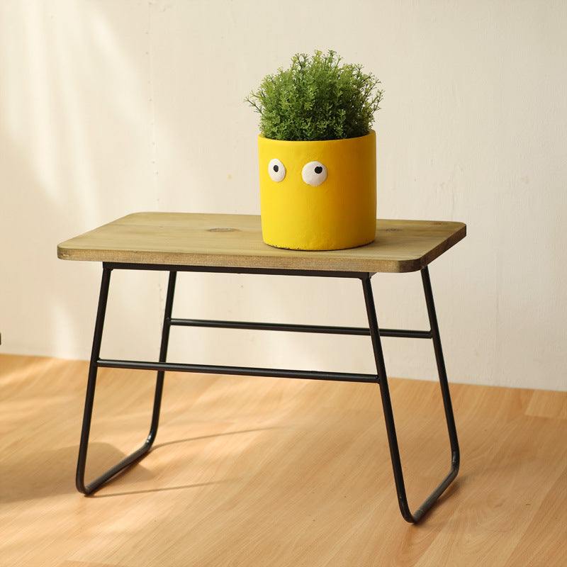 Moderner Holz-Hocker mit Metallgestell Brehn