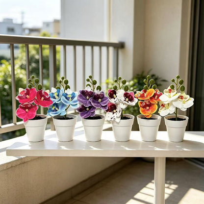 Lebensechte florale Orchideenarrangement für die Wohnkultur
