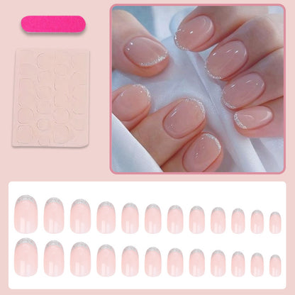 Kunstnagelset mit elegantem French-Tipp und Glitzer-Akzenten Brehn