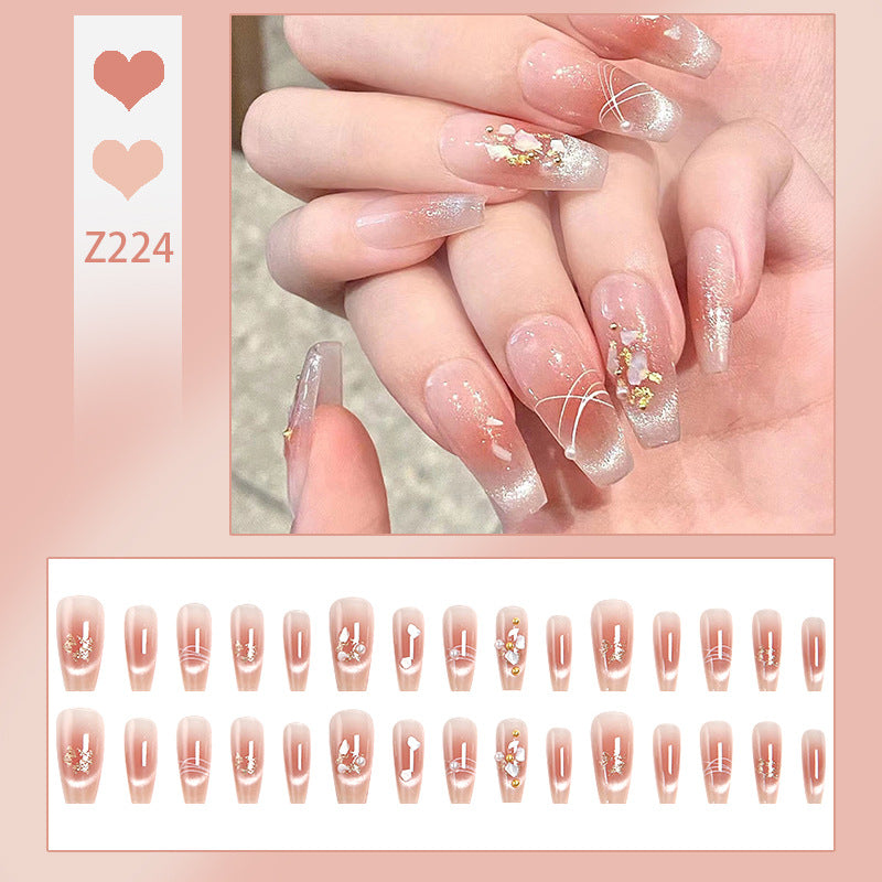 Kunstnagelset mit eleganten Glitzer- und Blumendekoren Brehn
