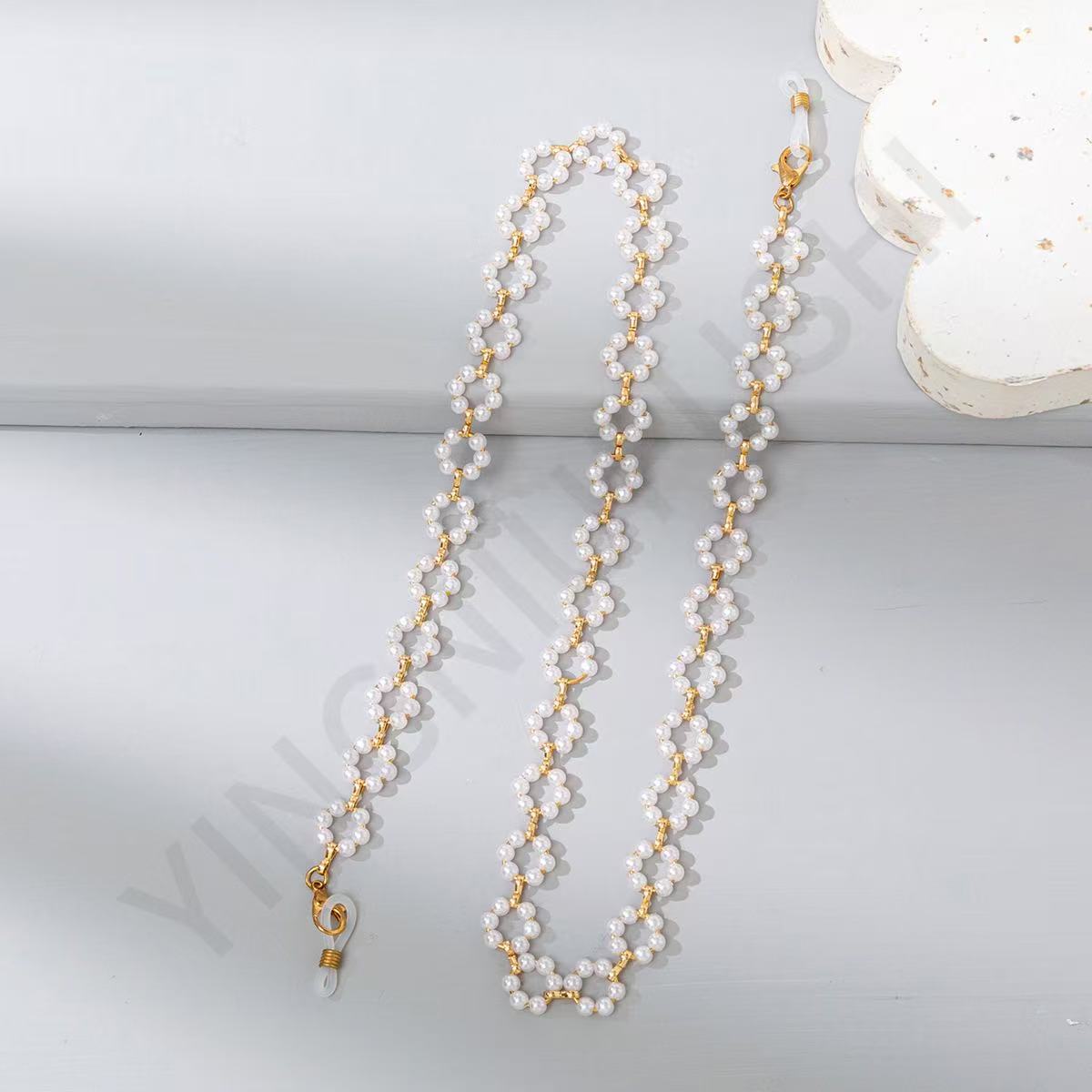 Eleganter Perl- und Goldketten-Brillenhalter Brehn