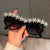 Damen Sonnenbrille mit floralen Kristallakzenten Brehn