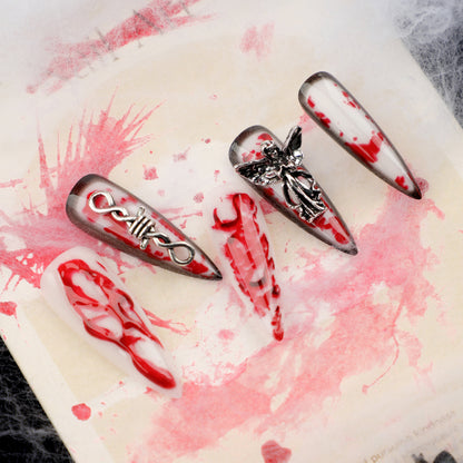 Kunstvolle Stiletto-Nägel mit Blut-und-3D-Design Brehn
