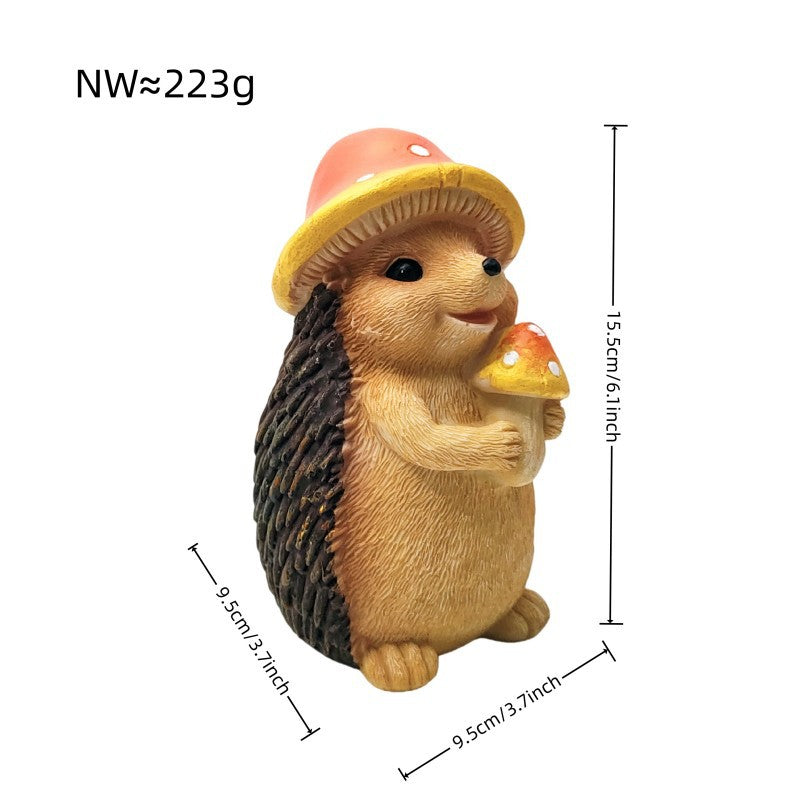 Niedliche Igel Skulptur mit Obst Brehn
