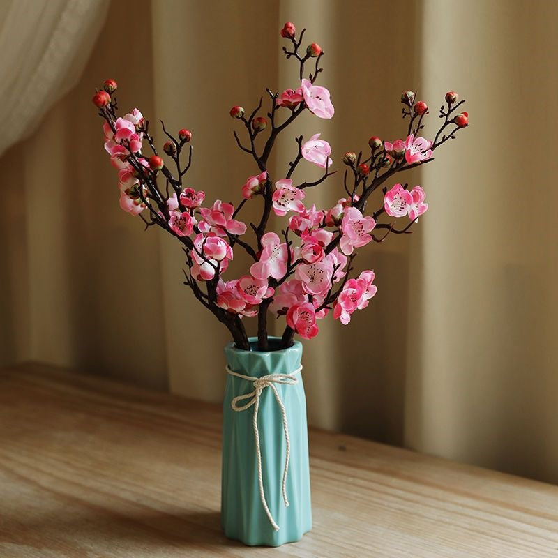 Dekorative Blumenäste Arrangement