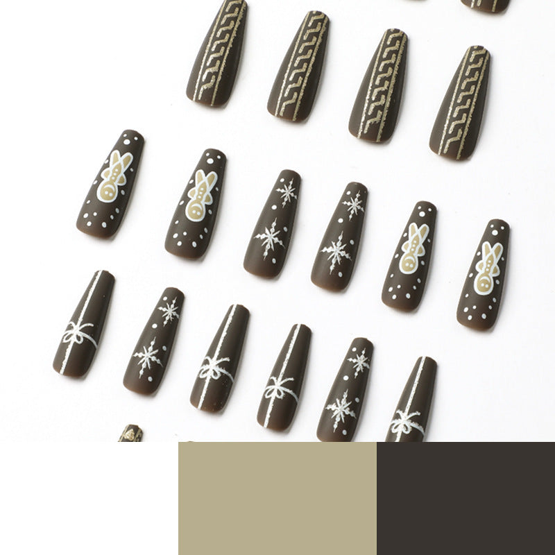 Künstliche Nagelkunst mit festlichem Lebkuchen-Design Brehn