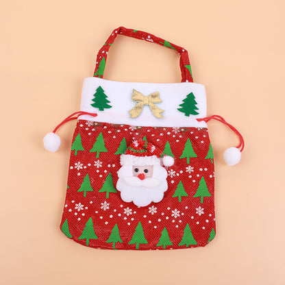 Niedlicher Weihnachtsgnom mit Geschenkesack Brehn