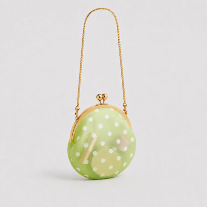 Elegante gepunktete Clutch-Handtasche