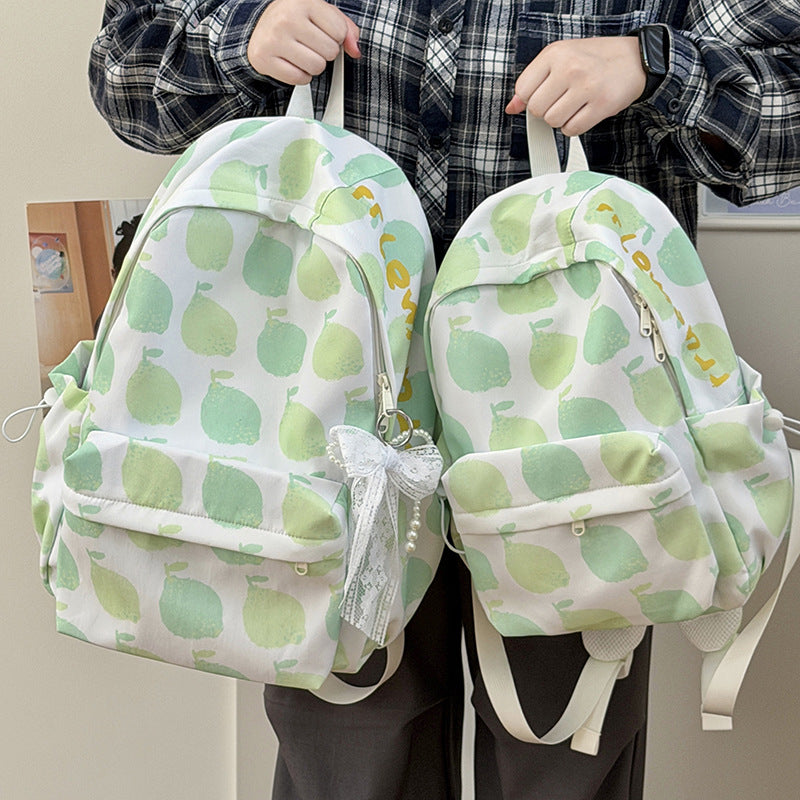 Verspielt gemusterter Rucksack mit Früchten