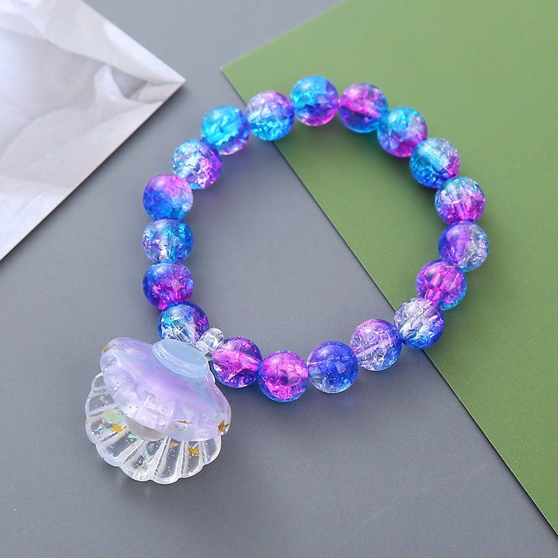 Verspieltes Armband mit Muschel-Anhänger Brehn