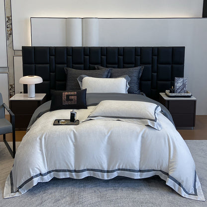 Premium-Bettwäscheset aus Baumwollsatin mit dezentem Blattmuster und feiner Kederkante