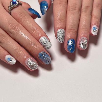 Kunstvolle Nagelverlängerungen mit funkelnenden Akzenten Brehn