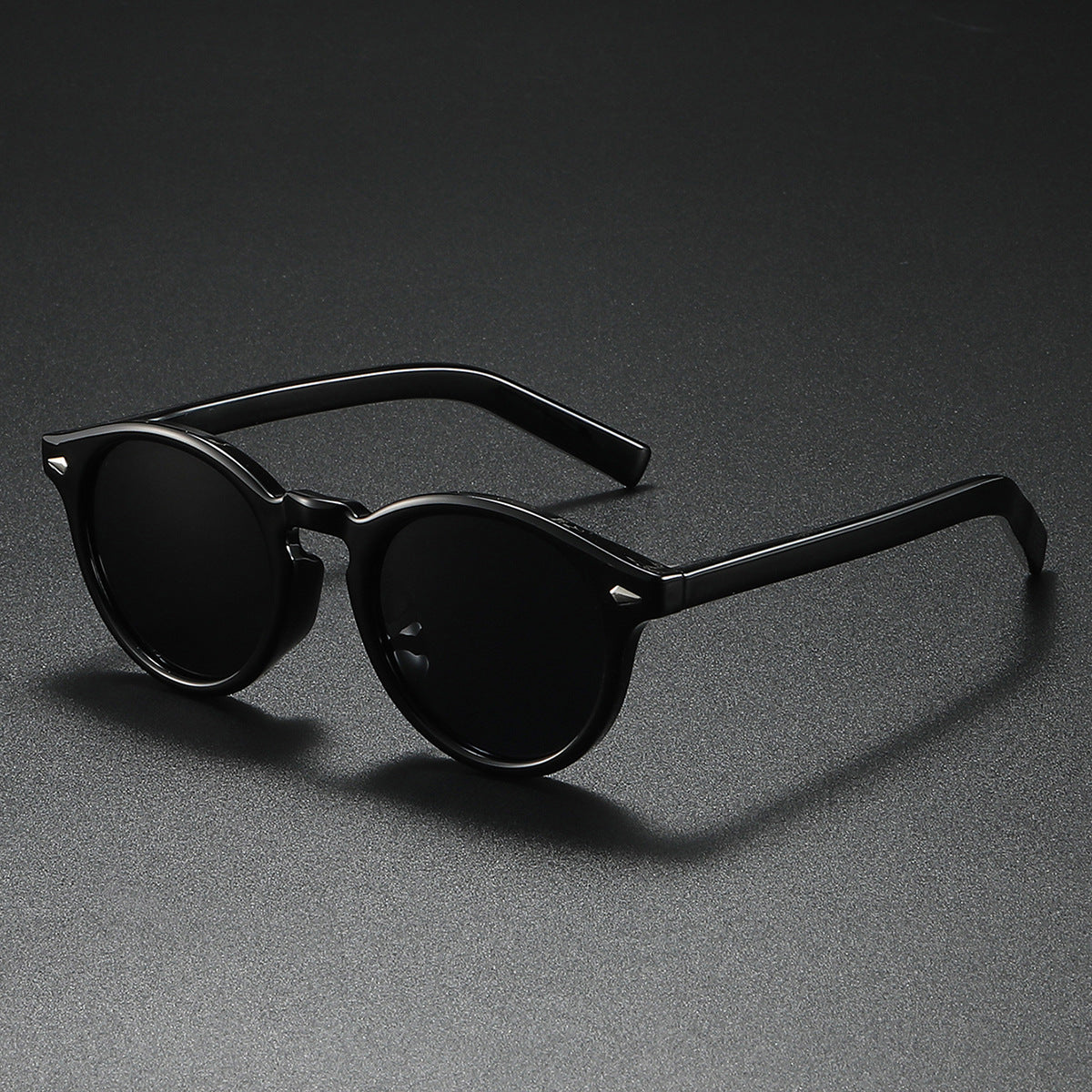 Damen Rund-Sonnenbrille mit transparentem Rahmen und reflektierenden Gläsern Brehn