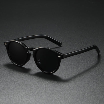 Damen Rund-Sonnenbrille mit transparentem Rahmen und reflektierenden Gläsern Brehn