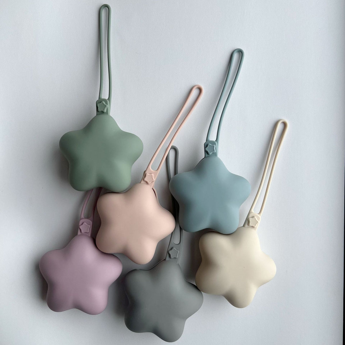 Weicher Silikon-Mini-Beutel Schlüsselanhänger in Sternform mit elastischer Schlaufe