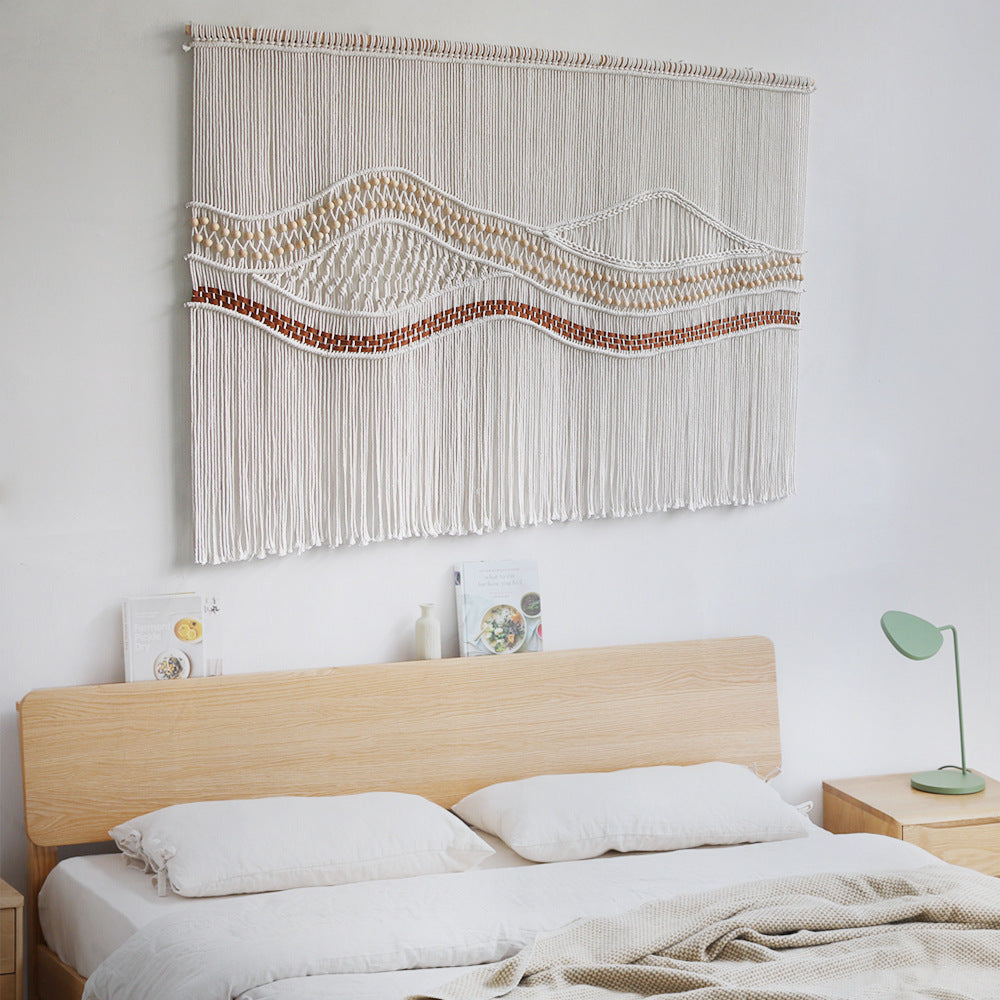 Künstlerische Makramé-Wandbehang mit eleganten Wellenmustern