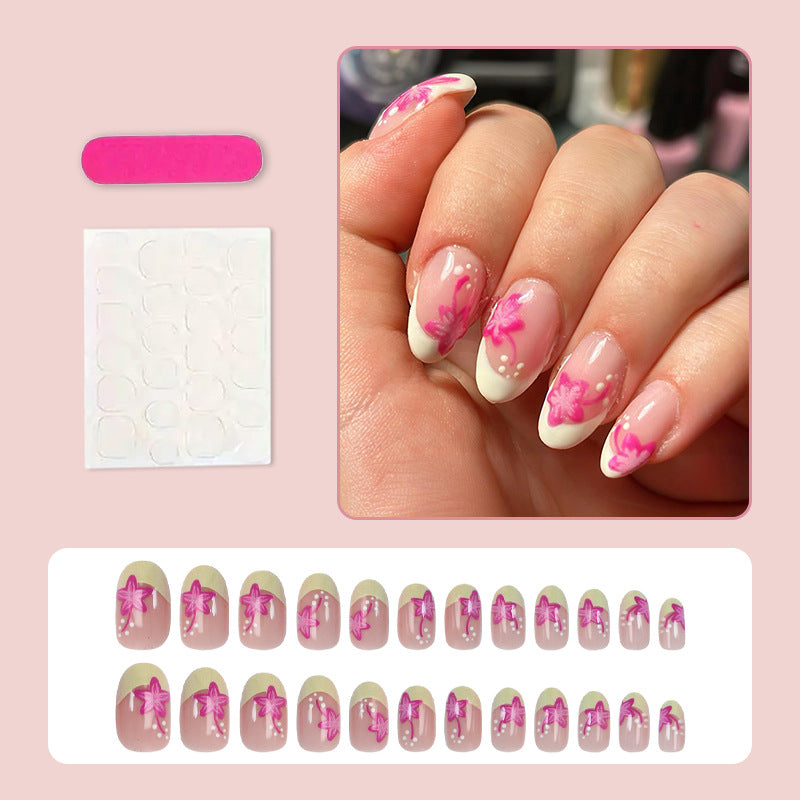 Kunstnagelset mit floralem Stil und eleganten Spitzen Brehn