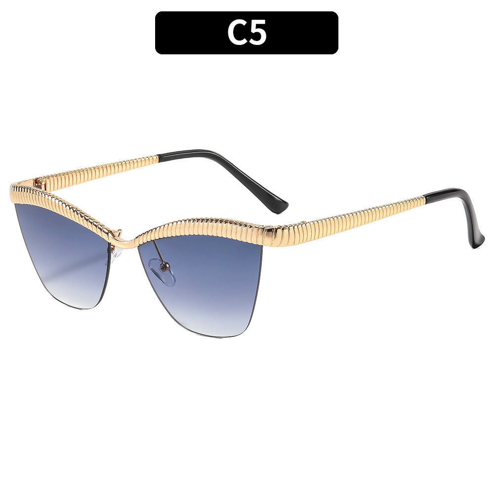 Stylische Katzenaugen-Sonnenbrille mit einzigartigem strukturiertem Rahmen