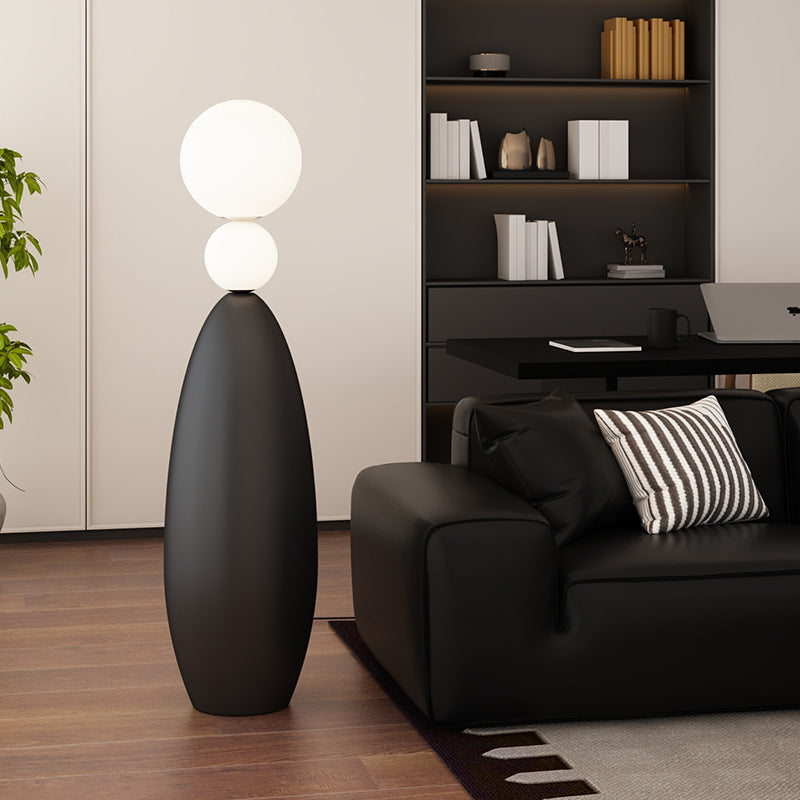 Skulpturale Stehlampe mit dualem Globusdesign