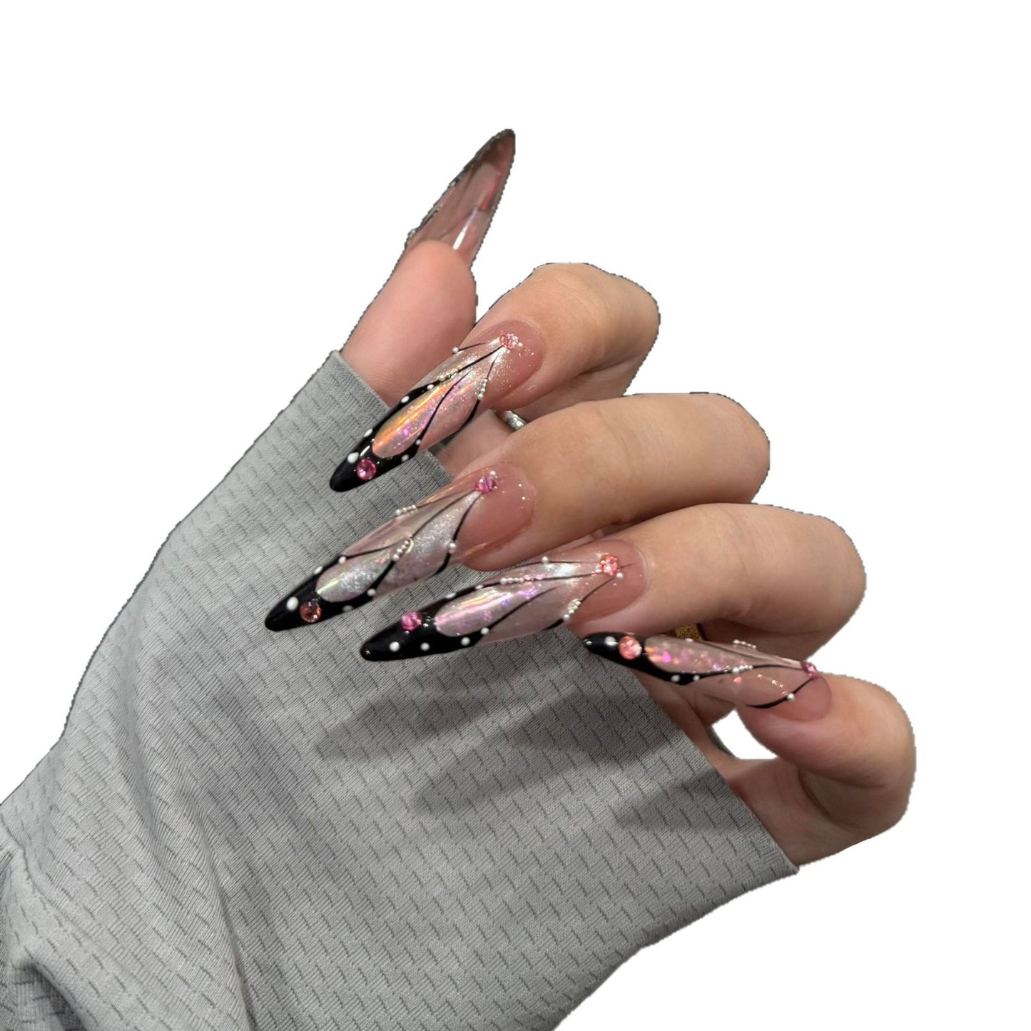 Kunstnagelspitzen mit Elegantem Designs und Glitzerakzenten Brehn