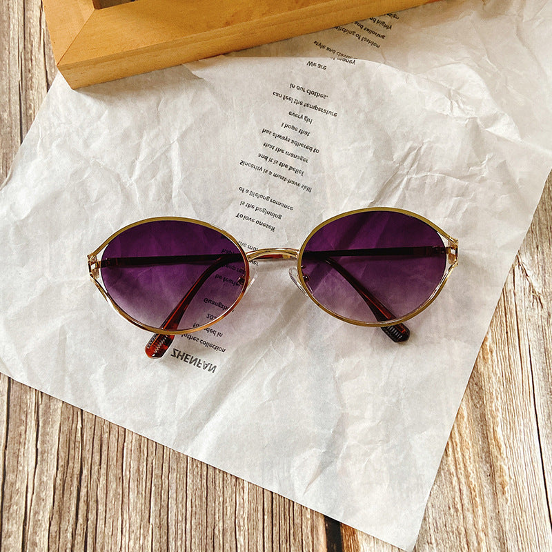 Runde Sonnenbrille mit Goldenen Akzenten Brehn