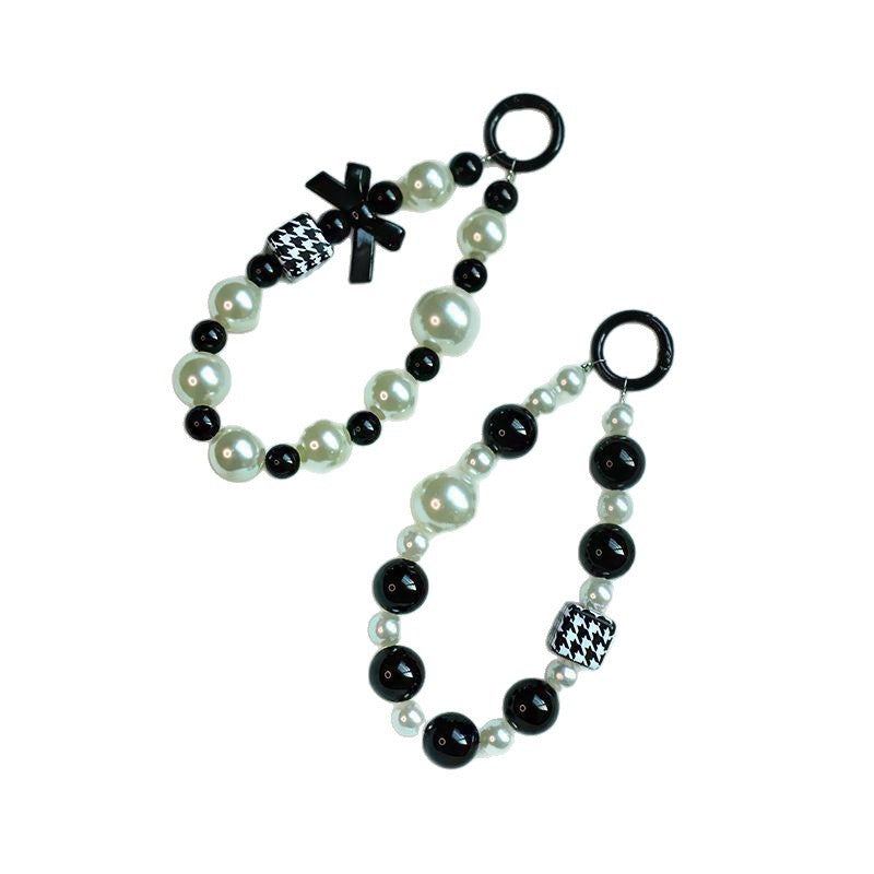 Elegante Perlen- und schwarze Perlen-Charm-Armband Brehn