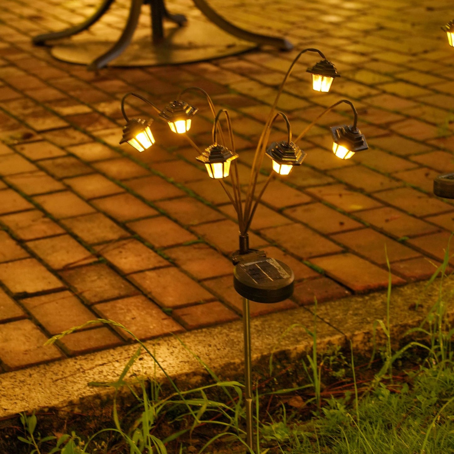 Dekorative Solar-Gartenstecker-Laternen mit mehreren Köpfen und warmem LED-Brehn