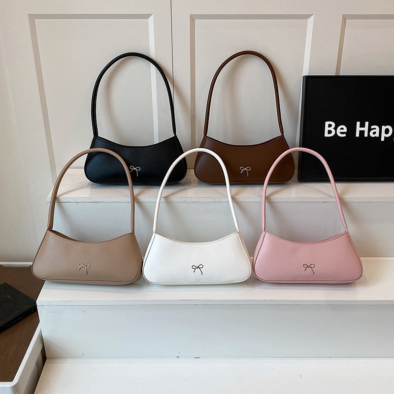 Elegante geschwungene Handtasche Brehn