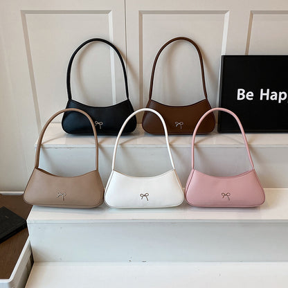 Elegante geschwungene Handtasche Brehn