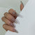 Kunstvolle Nagelspitzen mit Rosenmuster Brehn