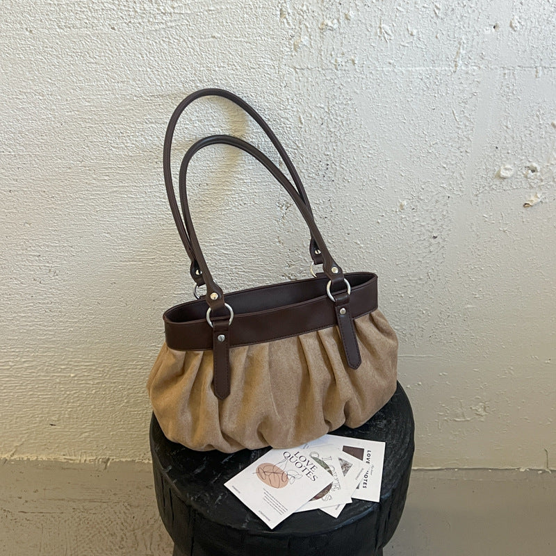 Geraffte Wildleder-Handtasche