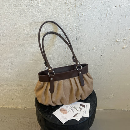 Geraffte Wildleder-Handtasche