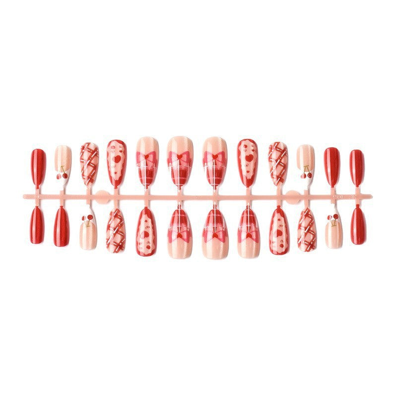 Kunstnagelset mit verspielten Herz- und Kirschmotiven Brehn