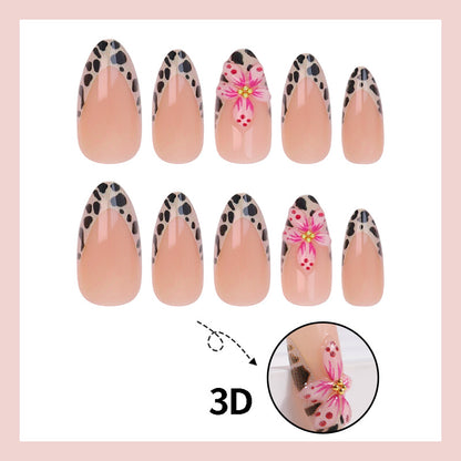 Kunstnagelset mit trendigen Blumenmotiven und eleganten Punkten Brehn