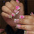 Elegante florale Press-On Nagelkunst mit Edelsteinakzenten Brehn