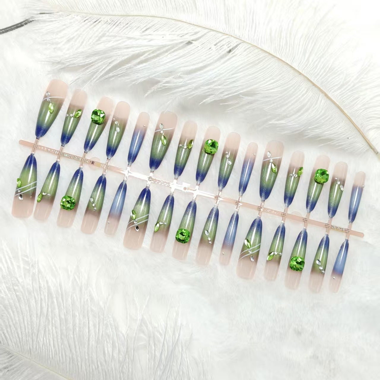 Kunstnägel mit elegantem Farbverlauf und Glitzerakzenten Brehn