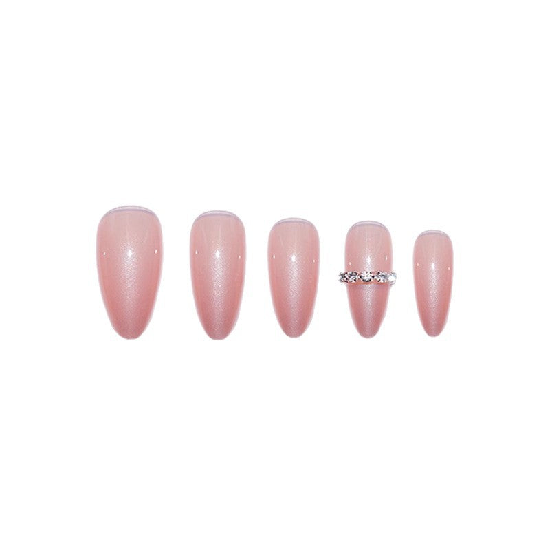 Elegante Stiletto Press-On Nagelkunst mit Edelsteinakzenten Brehn