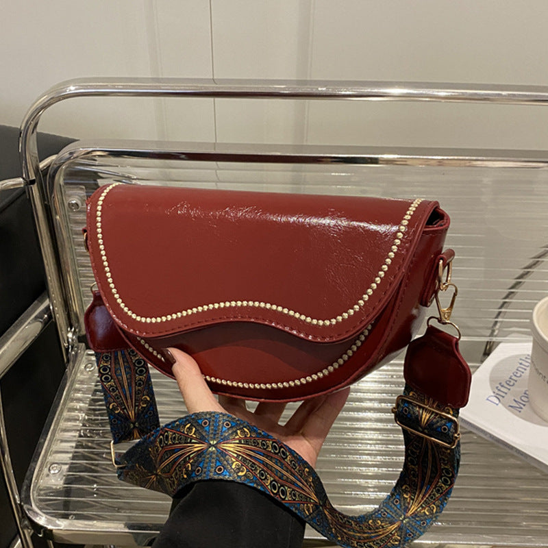 Elegante strukturierte Umhängetasche