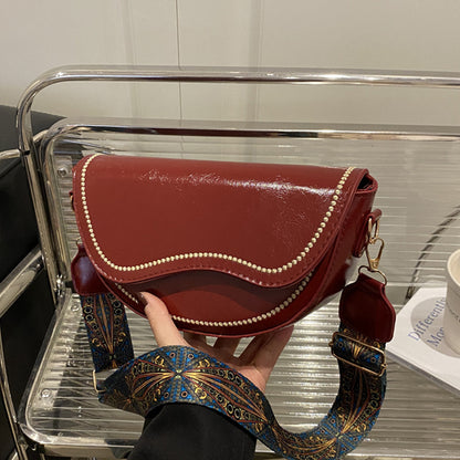 Elegante strukturierte Umhängetasche