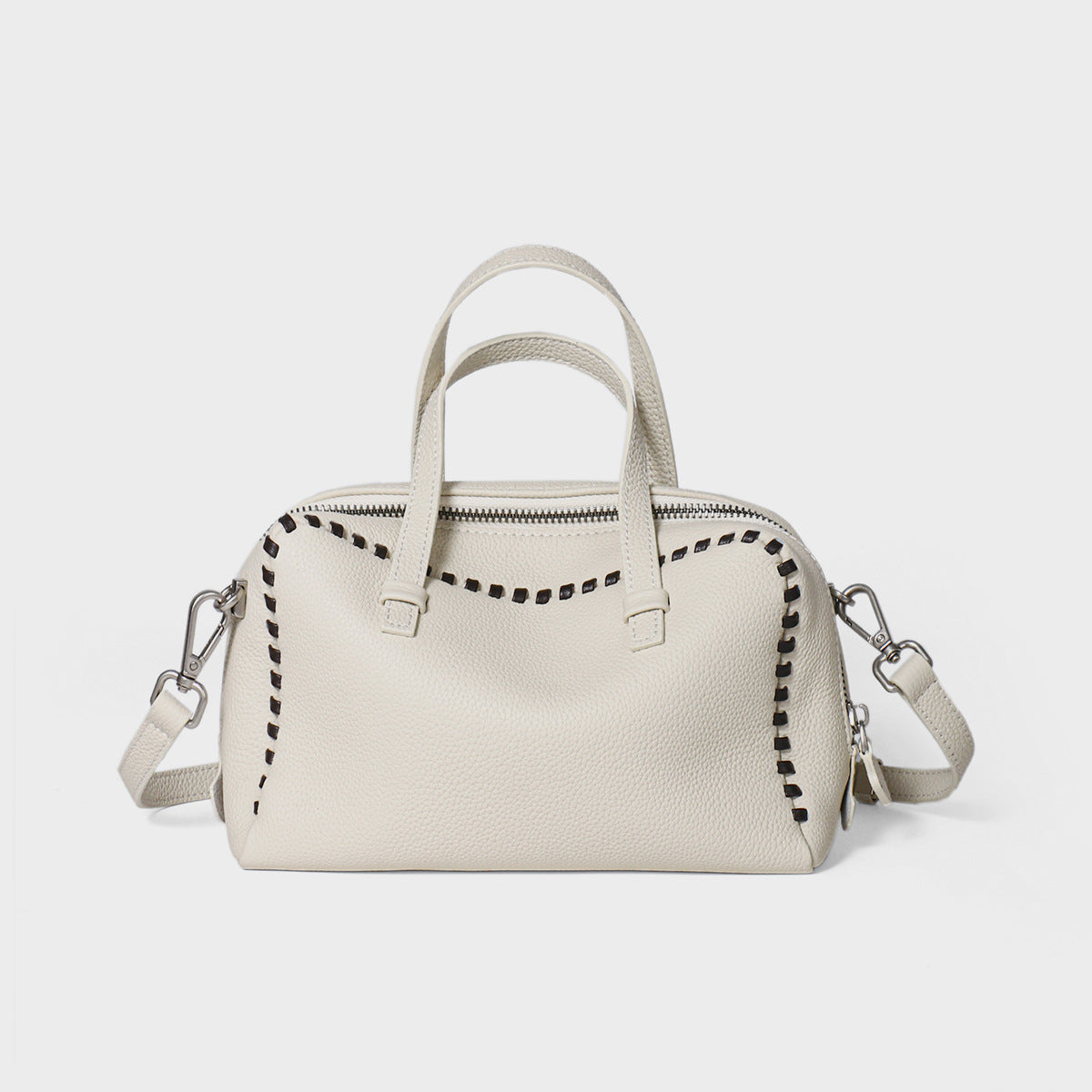 Gepunktetes Leder Arztstil-Satteltasche mit Whipstitch-Trimm und abnehmbarem Crossbody-Gurt
