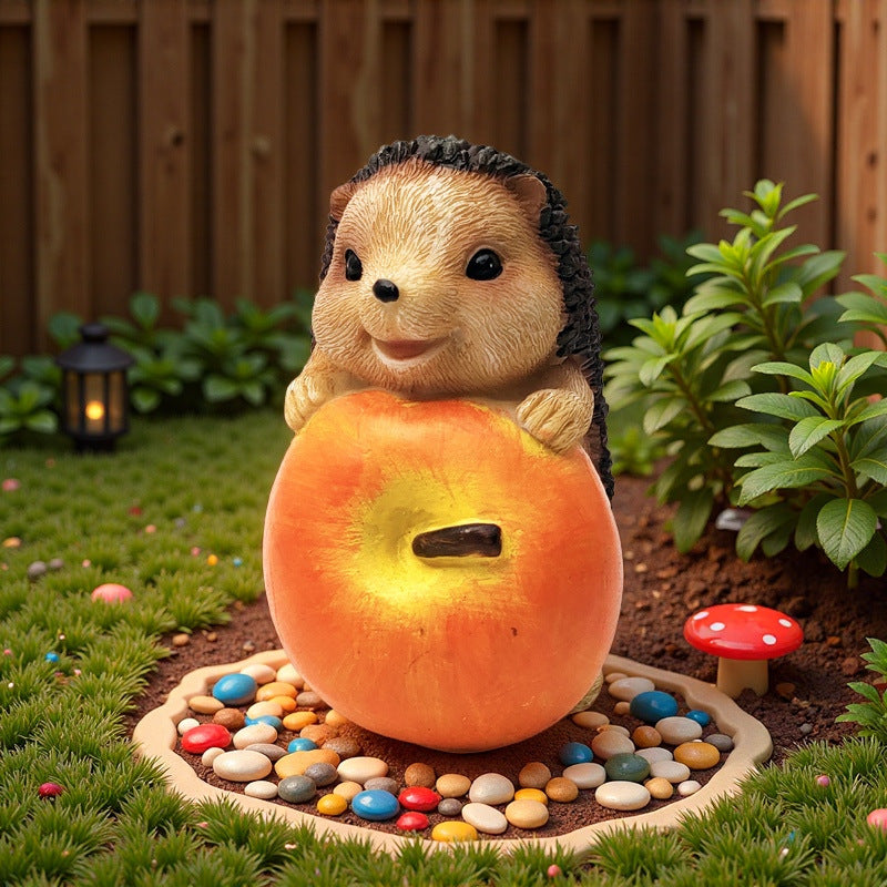 Niedliche Igel Skulptur mit Obst Brehn