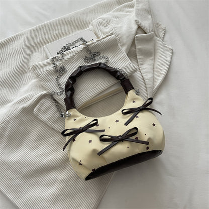 Stylische gepunktete Mini-Handtasche