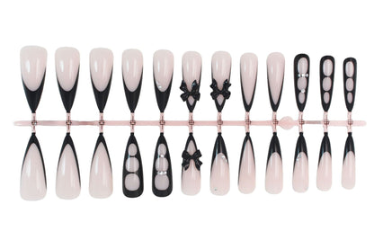 Kunstnagelset mit schimmernden Akzenten und eleganten Schleifen Brehn