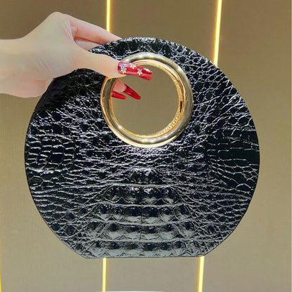 Rundering-Handtasche